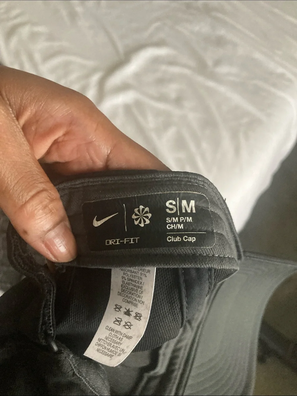 Nike Black Hat with White Swoosh Logo